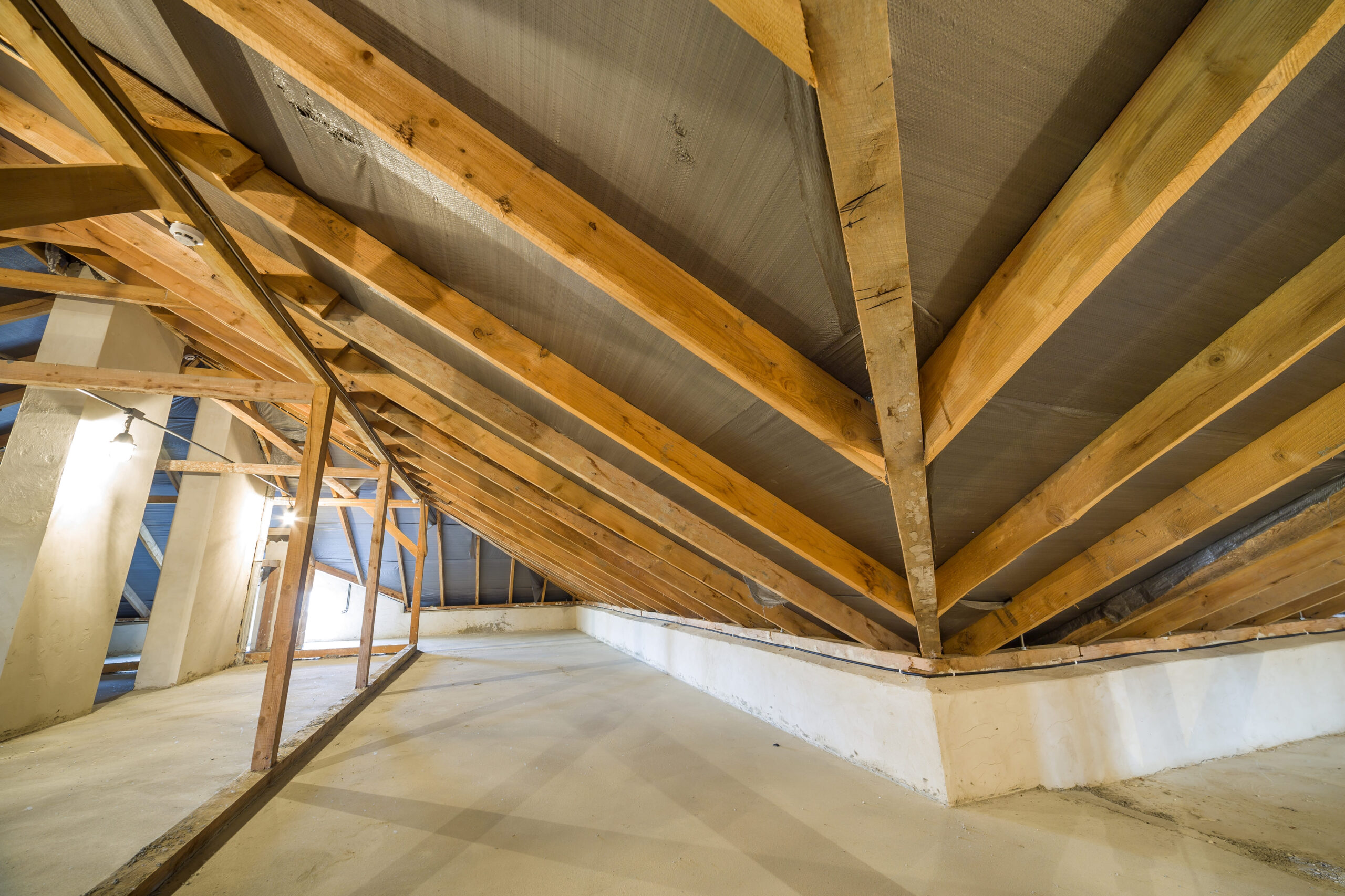 attic of a building with wooden beams of a roof st 2024 12 06 20 20 52 utc scaled